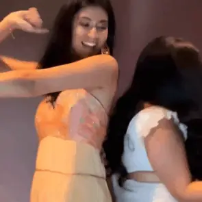 A guest laughing on the 360 platform as the camera circles