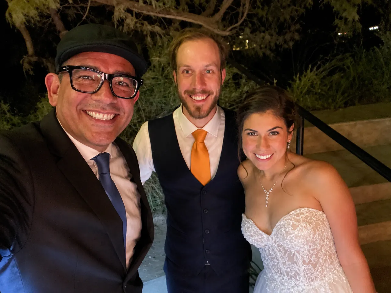 The iPix360 team with a bride and groom at their wedding