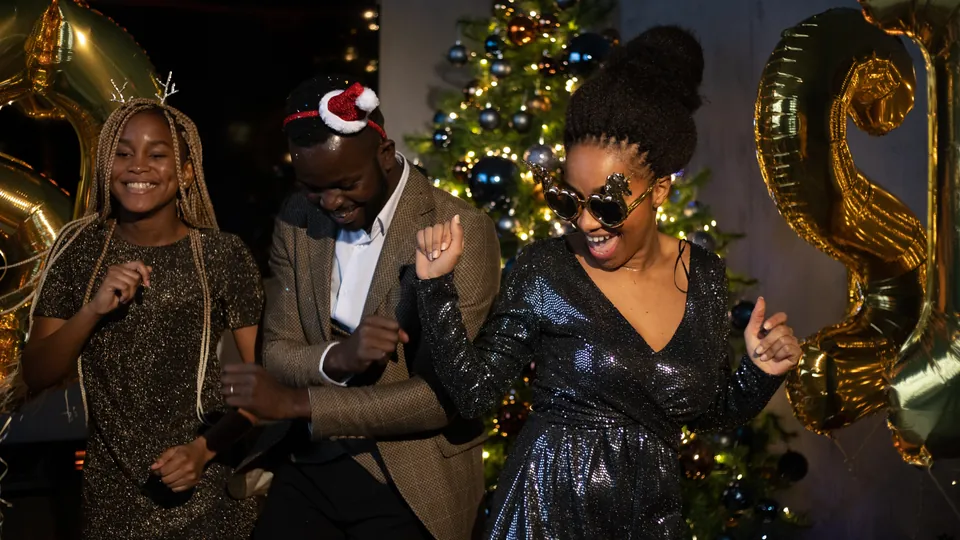 Guests dancing at a holiday party
